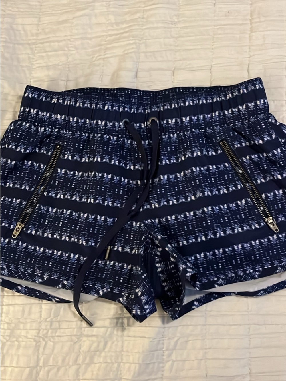 Athleta Navy Patterned Zip-Pocket Athletic Shorts